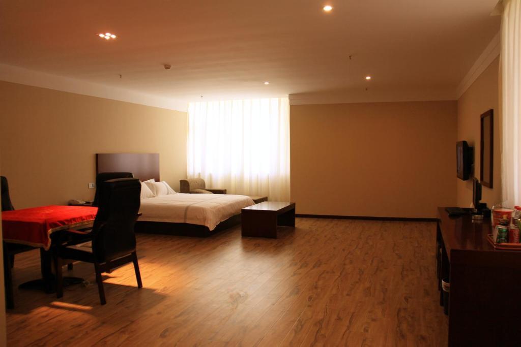 Zhou Wang Cheng Hotel Lojang Szoba fotó